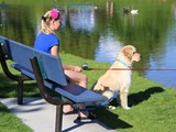 Girl fishing with her dog